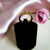Classic gold love inspired ring with signature engravings and luxury polished finish by Misk Shop