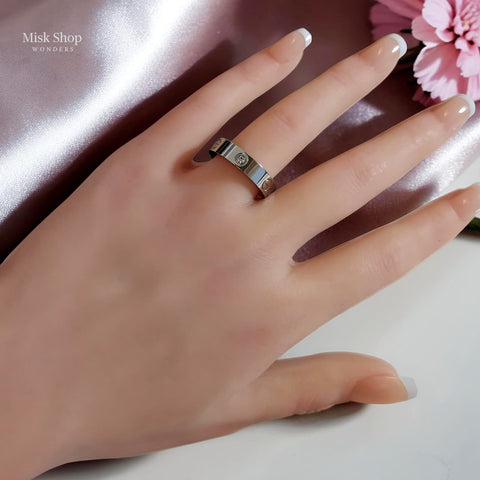 Classic silver love inspired ring plated with white gold and platinum featuring signature engravings by Misk Shop