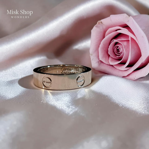 Classic silver love inspired ring plated with white gold and platinum featuring signature engravings by Misk Shop