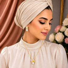 Cultured pearl floral zircon necklace and earrings set styled on a modest model