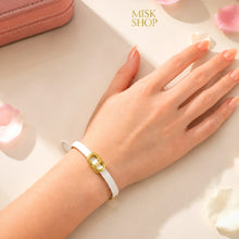 White CD link leather bracelet worn on wrist