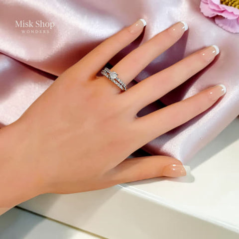 Elegant silver wedding ring with white gold plating and high clarity zircon stones by Misk Shop Jordan.
