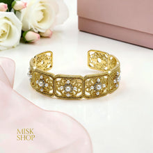 Open cuff floral pearl bracelet front view