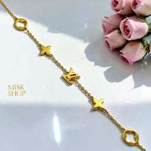 Gold-plated LV-inspired bracelet with polished flowers and openwork round motifs