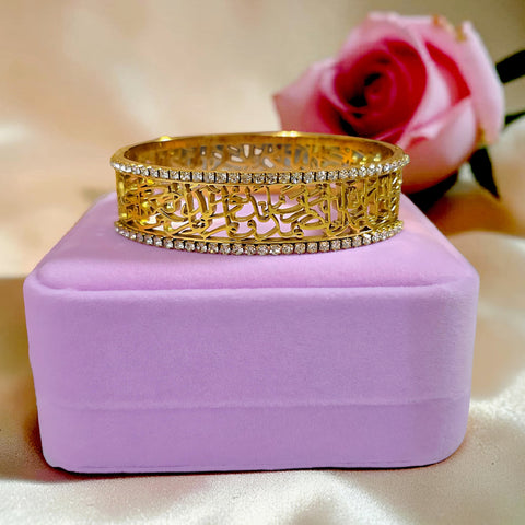 Misk Shop gold plated stainless steel Surah Al-Ikhlas bracelet in a copper-toned gold color with zircon borders