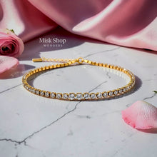 Gold-plated tennis anklet with sparkling zircon stones, available in gold and silver, featuring Misk Shop Color Protection Technology.