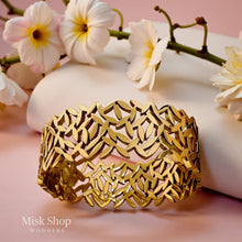 21K gold plated wide bold bracelet worn on hand
