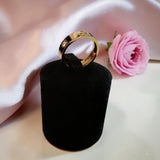 18K gold plated love inspired ring with sparkling zircon stone and signature screw motif design available in multiple sizes by Misk Shop