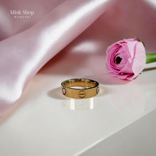 18K gold plated love inspired ring with sparkling zircon stone and signature screw motif design available in multiple sizes by Misk Shop