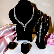 Luxury 4-piece bridal zircon jewelry set with necklace, earrings, bracelet, and ring
