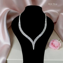 Luxury 4-piece bridal zircon jewelry set with necklace, earrings, bracelet, and ring