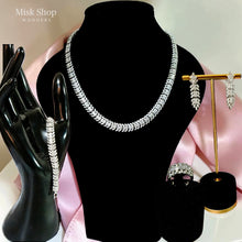 Luxury classic zircon jewelry set with necklace, earrings, bracelet, and free-size ring for elegant bridal and formal occasions