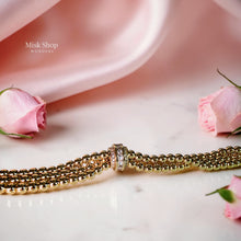 Luxury triple bubble ball bracelet with three gold bead strands and a sparkling zircon clasp, 18K gold plated for women by Misk Shop.