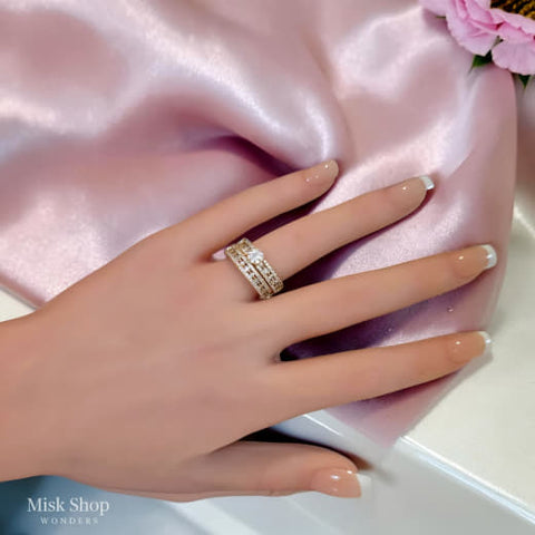 Luxury wide wedding ring with 21K gold plating and high clarity zircon stones by Misk Shop Jordan.