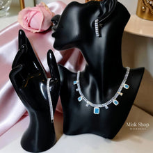 Luxury zircon jewelry set with necklace, bracelet, and earrings in emerald green or turquoise blue