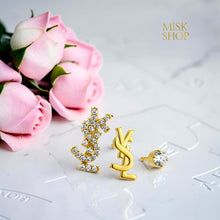 18K gold plated three-piece earring set with embellished YSL monogram, polished YSL monogram and round clear stud