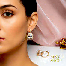 18K gold plated rectangular zircon drop earrings worn on a model