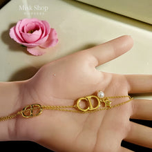 Gold plated CD bracelet with pearl and star charm from Misk Shop
