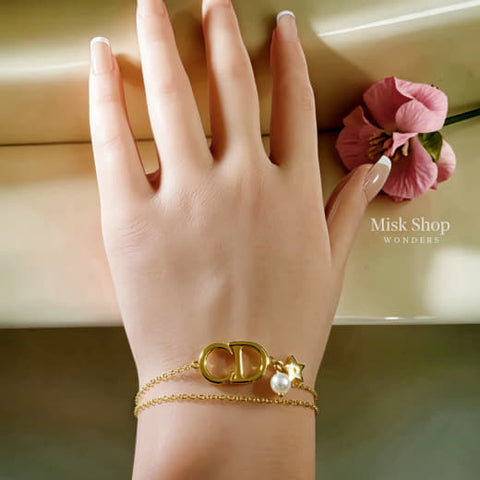 Gold plated CD bracelet with pearl and star charm from Misk Shop