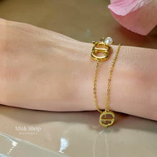 Gold plated CD bracelet with pearl and star charm from Misk Shop