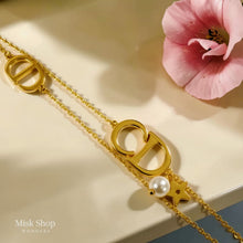 Gold plated CD bracelet with pearl and star charm from Misk Shop