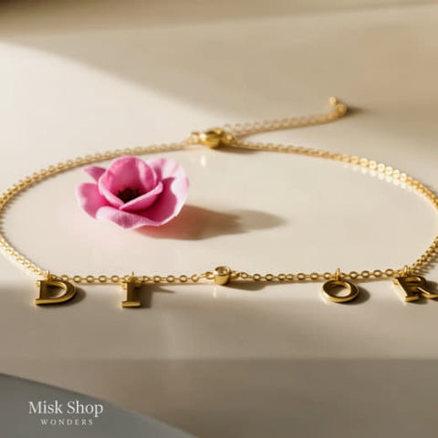 Gold plated letter charm bracelet with zircon stone from Misk Shop