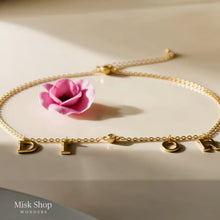 Gold plated letter charm bracelet with zircon stone from Misk Shop