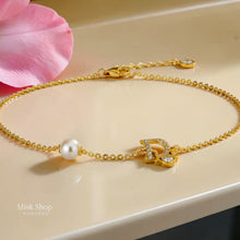 Gold plated letter D bracelet with pearl and zircon from Misk Shop