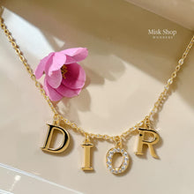 Gold plated letter necklace with zircon detail from Misk Shop