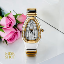 Close-up of MISS FOX two-tone watch with crystal-set dial and bezel