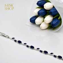 Silver-tone tulip vine bracelet with navy zircon stones
