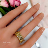 Gold open free-size zirconia ring worn on hand