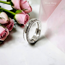 White gold plated zirconia wedding ring shown from the side