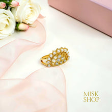 Pearl and zircon lattice ring close-up