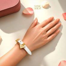 White Prada triangle-logo adjustable leather bracelet worn on wrist