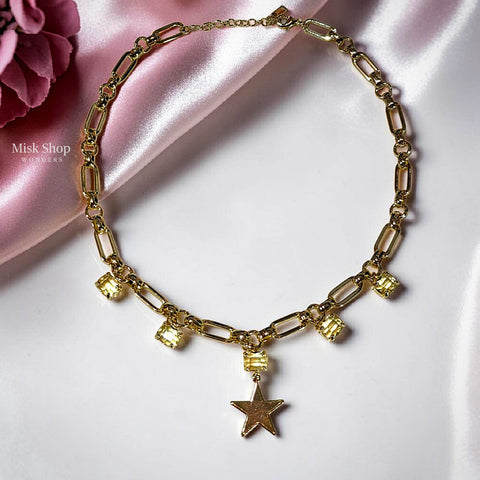 21K gold plated star necklace with high clarity yellow zircon stones and elegant paper clip chain design by Misk Shop