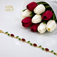 Gold-tone tulip vine bracelet with red and green zircon stones