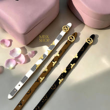 Reversible LV-inspired adjustable leather bracelets in dark brown, camel brown, and white