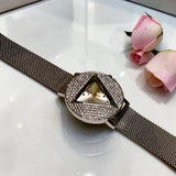 Silver-tone women's triangular dial mesh watch with zircon frame by Misk Shop.