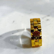 Close-up of gold Rolex-inspired stainless steel ring
