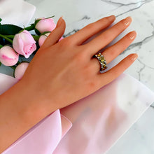 Two-tone Rolex-inspired ring worn on hand