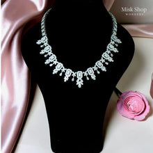 Luxury royal aristocratic zircon jewelry set with necklace, drop earrings, bracelet, and free-size ring for bridal and evening glamour