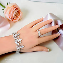 Luxury royal aristocratic zircon jewelry set with necklace, drop earrings, bracelet, and free-size ring for bridal and evening glamour