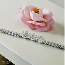 Luxury royal aristocratic zircon jewelry set with necklace, drop earrings, bracelet, and free-size ring for bridal and evening glamour