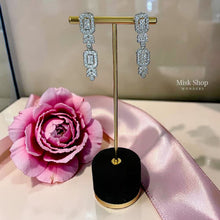 Luxury royal aristocratic zircon jewelry set with necklace, drop earrings, bracelet, and free-size ring for bridal and evening glamour