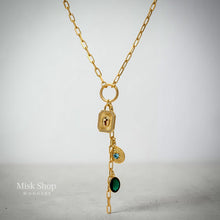 18K gold plated long necklace with emerald green zircon stone, blue zircon accents and elegant paper clip chain design by Misk Shop