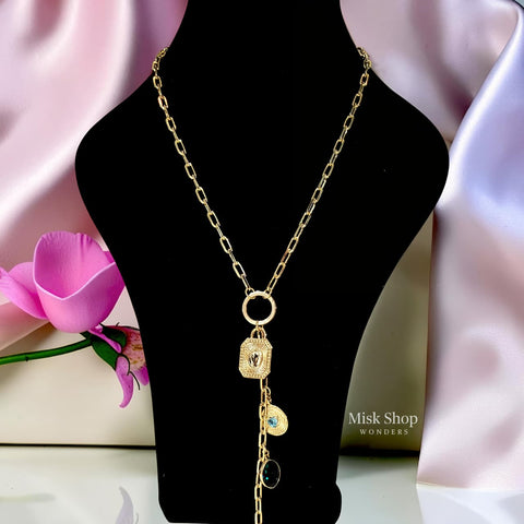 18K gold plated long necklace with emerald green zircon stone, blue zircon accents and elegant paper clip chain design by Misk Shop
