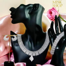 Royal luxury zircon jewelry set with statement necklace, earrings, bracelet, and free-size ring for bridal and luxury formal occasions