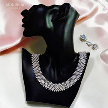 Royal luxury zircon jewelry set with statement necklace, earrings, bracelet, and free-size ring for bridal and luxury formal occasions