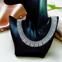 Royal luxury zircon jewelry set with statement necklace, earrings, bracelet, and free-size ring for bridal and luxury formal occasions